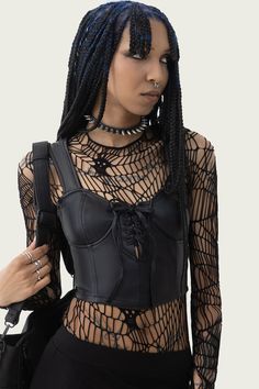 MOONLESS.- Smooth PU corset.- Wide shoulder straps.- Cropped.- Lace up detail.- Back zip closure.- Fitted.With KIHILIST branding, 60% Polyurethane 40% Polyester, Excluding Trims.Hand wash delicate (30°C) / Do not bleach / Do not tumble dry / Do not iron / Do not dry clean. Imported. Gothic Corset Belt With Corset Back For Club, Faux Leather Corset For Club, Edgy Overbust Corset For Alternative Fashion, Edgy Halloween Corset For Alternative Fashion, Faux Leather Club Corset, Faux Leather Corset With Corset Back, Edgy Corset With Corset Back For Alternative Fashion, Gothic Black Corset With Zipper Closure, Black Punk Corset With Straps