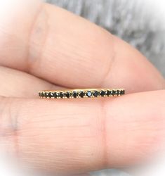 "- BLACK DIAMOND 3/4th Eternity Pave Band/ Anniversary Band/ Wedding Band/ Stackable Ring/ Matching Wedding Band MaterialGold (14K & 18K) or PLATINUM 950 FinishingHigh Polished/ Shiny PlatingRhodium (only if WHITE gold) FitComfort/ Rounded Interior Width1.6 mm Height1.6 mm SettingU Micro Pave Set (Reminds the Letter \"U\" from sides) StonesGenuine Diamonds ColorBlack QualityAAA Total Caratapx 0.40 This ring is full of elegance and beauty! It is so simple and so complete at the same time! One Black Round Eternity Band For Anniversary, Black Eternity Band For Anniversary, Black Stackable Round Cut Rings, Elegant Black Bands For Anniversary, Elegant Black Anniversary Bands, Black Stackable Rings With Round Band, Black Stackable Round Band Rings, Black Stackable Rings For Anniversary, Elegant Black Bands Suitable For Gifts