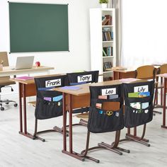 a classroom with desks, chairs and a chalkboard