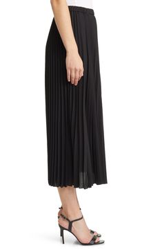 Allover accordion pleats lend graceful movement to this easy pull-on skirt. Lined 100% polyester Dry clean Imported Elegant Pleated Skirt With Elastic Waistband, Evening Accordion Pleated Flowy Skirt, Workwear Midi Length Pleated Skirt With Elastic Waistband, Workwear Full Pleated Skirt With Elastic Waistband, Pleated Midi Skirt With Elastic Waistband For Work, Black Pleated Skirt With Accordion Pleats, Black Accordion Pleated Skirt, Elegant Stretch Pleated Tiered Skirt, Chic Black Pleated Skirt With Accordion Pleats