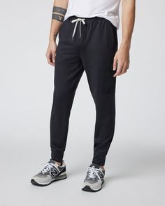 Our best-selling joggers get reinvented with added function on the Sunday Utility Jogger. This version of our classic bottoms features woven cargo pockets on the same 88% recycled performance stretch fabric you already love. | Vuori Sunday Utility Jogger Pants | Black | XL Vuori makes premium performance apparel inspired by the active Coastal California lifestyle; an integration of fitness, surf, sport, and art. Breaking down the boundaries of traditional activewear, we are a new perspective on Techwear Joggers With Side Pockets For Jogging, Casual Joggers With Functional Pockets For Jogging, Functional Tapered Leg Activewear With Side Pockets, Casual Jogging Bottoms With Functional Pockets, Casual Jogging Pants With Functional Pockets, Midweight Athleisure Bottoms With Functional Pockets, Functional Relaxed Fit Tapered Leg Joggers, Athleisure Bottoms With Functional Pockets In Recycled Polyester, Athleisure Cotton Joggers With Cargo Pockets