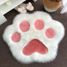 an animal paw rug is on the floor