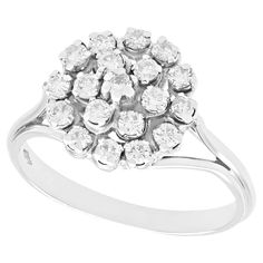 a diamond cluster ring in white gold