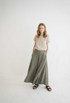 "DETAILS * Long wide leg linen pants * Summer linen cullotes * With two side pockets and side zipper * Femine look for your linen outfit * Made from soft wash medium weight (185 gsm) 100 % European linen fabric * Height of the model is 177 cm (5' 8\") and she is wearing pants in size XS/S, sage green color * Please choose another color and size on the right * Product number: P10 CARE LABEL * machine wash gentle (40 C/104 F) * dry gentle on low heat * wrinkles give the character so there is no ne Midsize Linen Pants Outfit, Khaki Wide Leg Cargo Pants, Khaki Linen Bottoms With Pockets, Wide Leg Linen Pants With Side Pockets, High-waisted Wide Leg Linen Pants With Side Pockets, Spring Linen Wide Leg Pants With Side Pockets, Linen Wide Leg Pants With Side Pockets For Spring, Khaki Linen Pants With Side Pockets, Linen Wide Leg Pants With Side Pockets