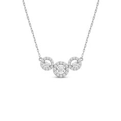 This is that necklace that shines during the day and well into the night. With a classic sparkle, this piece can be worn with any outfit, on any occasion. The necklace features a dainty chain securing a sparkling pendant composed of three concentric rings in a horizontal layout. Each circular outline is traced with diamonds and punctuated at the center with a dancing diamond that flashes a captivating twinkle at even the slightest movement. Sterling Silver Round Diamond Necklace For Evening, Sterling Silver Diamond Necklace For Evening, Brilliant Cut Round Necklaces For Evening, Formal Diamond White Necklaces With Delicate Chain, Formal Diamond Necklace With Round Pendant, Formal Diamond White Necklace With Delicate Chain, Formal Round Necklace With Delicate Chain, Diamond White Round Necklaces For Evening, Round Necklace With Delicate Chain For Formal Occasions