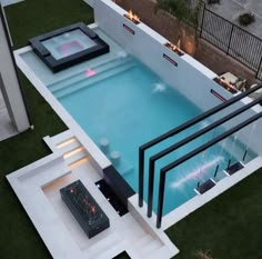 an above ground swimming pool surrounded by grass