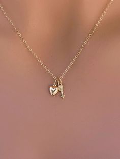 14k solid gold Angle wing , paw print & heart  necklace. The best gift for Pet lover necklace. All components onto 14k solid gold. it consists of .. -14k Solid Gold 9.7x3.9mm intinity link, and  -14k Solid Gold 6mm puffed Heart Pendant attach onto  -14k Solid yellow gold baby Box chain or Cable chain or Rope chain , -Come up with beautiful jewelry gift box and -One set of Care instruction package .  MORE Solid GOLD JEWELRY https://www.etsy.com/shop/rainbowearring1/items?section_id=22350831 MORE 14k Stamped Jewelry For Valentine's Day Gift, Tiny Heart Pendant Jewelry For Valentine's Day, Heart Charm Jewelry For Best Friend Gift, Dainty Heart Pendant Charm Necklace For Best Friend, Dainty Heart Pendant Necklace For Best Friend, Elegant Heart Pendant Jewelry For Best Friend, Valentine's Day Tiny Heart Pendant Jewelry, Double Heart Charm Jewelry For Best Friend, Heart Charm Double Heart Jewelry For Best Friend