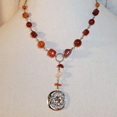 Orange And Red Theme Quartzite, Carnelian, And Fire Agate Beaded Cresent Moon And Sun Charm Necklace. Charms Are Approximately 28x24mm. Necklace Measures 16 Inches With A Lobster Clasp And 1.5 Inch Extension Chain. Chain Can Be Made Longer Or Shorter Upon Request! #Moon #Sun #Silver #Boho #Hippie Silver Carnelian Bohemian Necklaces, Bohemian Silver Carnelian Necklaces, Silver Carnelian Bohemian Necklace, Red Carnelian Spiritual Jewelry, Silver Carnelian Beaded Necklace With Gemstone Beads, Silver Beaded Carnelian Necklaces, Silver Beaded Carnelian Necklace, Silver Carnelian Beaded Necklace, Spiritual Silver Carnelian Necklace