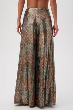 With an ultra-wide leg and floaty fabrication, these butterfly-printed silk pants are the ultimate showstopper this season. Pair these wide-leg silk pants with our matching butterfly-printed silk top for a complete look. Flat front Side zipper Ultra-wide leg Full-length Inseam: 32.5" Runs true to size Model is 5'10", wearing size 2 See Women's Size Guide FABRIC: Mystical Monarch Silk Metallic 64% Silk, 36% Metallic Dry clean only Imported Due to its large-scale print, each garment may have a uni Silk Wide Leg Pants, Ultra Wide, Silk Pants, Wide Leg Pant, Printed Silk, Trina Turk, Butterfly Print, Silk Top, Silk Printing