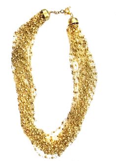 "Layered GOLD Beaded necklace perfect for the upcoming holiday parties ** Multi strand fine beaded Necklace ** hand beaded jewelry ** Length of Necklace is 18 inches ** Perfect on a Little Black Dress or even a T-shirt. ** Make a statement this thanksgiving or be the spice of the Christmas party. This beautiful necklace would make a great Holiday Gift for someone special. All Items come carefully gift wrapped in branded boxes or bags. A complimentary message can be included on request. PRESS: \" Gold Jewelry For Holiday Party, Holiday Party Gold Jewelry, Multi-strand Gold Jewelry For Celebration, Party Jewelry In Gold-tone With Gold Beads, Gold Necklace With Beaded Chain For Party, Gold Beaded Party Jewelry, Gold-tone Multi-strand Chain Necklace For Party, Multi-strand Gold Necklaces For Celebrations, Multi-strand Gold Necklace For Celebrations