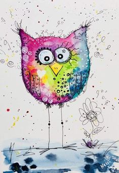 a colorful owl sitting on top of a tree branch next to watercolor paint splatters