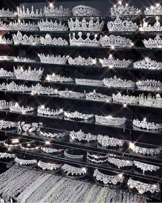 there are many tiaras on display in the store