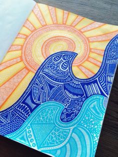 an elephant is painted on top of a piece of paper with the sun in the background