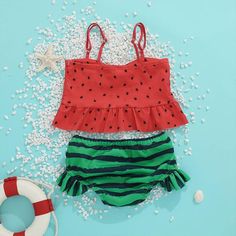 *Product Title:Toddler Girl Watermelon Print 2-piece Swimsuit*Keyword Tag:children's boutique wholesale*Fabric:Polyester*Thickness:Regular*For Season:Summer*Care Label:On the inside Summer Cotton Sets With Strawberry Print, Summer Beachwear Tankini, Summer Beachwear Tankini For Playtime, Playful Cotton Sets For Beach Season, Summer Beach Tankini, Cute Green Vacation Sets, Playful Green Sets For Vacation, Playful Green Vacation Sets, Cute Summer Tankini For Playwear