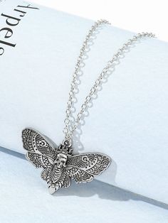 Material: AlloyStyle: Hip-HopElement: SkullType: Solid Color Occasion: Halloween/Daily Halloween Moth, Best Selling Jewelry, Skull Pendant Necklace, Skull Pendant, Selling Jewelry, Silver Necklaces, Moth, Pendant Necklaces, Silver Necklace