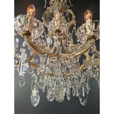 a crystal chandelier hanging from the ceiling