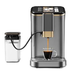 an espresso machine with a cup of coffee being poured into it and next to the glass container