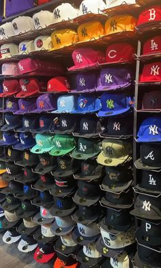 many hats are on display in a store