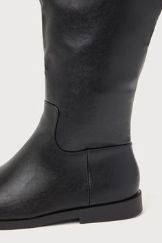 The Finla Black Knee-High Boots are a perfect pick when it comes to looking so fashionable this season! Sleek, ultra-smooth faux leather shapes these chic boots that feature a rounded toe upper, seam detailing at the vamp, and a 14.75"" knee-high shaft with an asymmetrical topline and a 15.75"" circumference. 8.5"" zipper at the instep. A cute yet comfortable low-block heel completes the trendy design! 1" rubber heel. Lightly cushioned insole. Rubber sole has nonskid markings. Man made materials Chic Boots, Lulu Fashion, Black Knee High Boots, Black Knees, Low Block Heels, The Vamps, Heel Boots, Rubber Heels, High Heel Boots