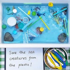 a plastic tray filled with different types of crafting supplies and writing on the side