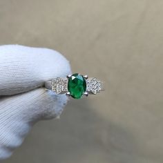 💍 Amazing Green Emerald Ring 💍 Metal : 925 Sterling Silver. Stones : Created Emerald  Side Stone: CZ Ring Weight: 3.6 Gram Stone Size : 8X6 MM  Stone Shape: Oval Stone Weight - 1.1 ct Anti-tarnishing coated This stunning ring is crafted with good-quality emerald lab created stone with 925 sterling silver. The green gemstones create a beautiful contrast against the polished silver ring. The ring is perfect for stacking with other rings and can be worn as a standalone piece. A ring perfect gift Vs Clarity Emerald Ring In Fine Jewelry Style, Green Emerald Open Ring With Vs Clarity, Vs Clarity Open Emerald Ring, Emerald Ring With Vs Clarity And Round Cut, Round Cut Emerald Ring With Vs Clarity, Sterling Silver Emerald Ring With Vs Clarity For Promise, Emerald Rings With Vs Clarity In Round Cut, White Gold Emerald Ring With Vs Clarity For May, Green Diamond Ring With Vs Clarity And Emerald Cut