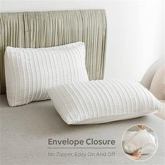 two pillows and a pillow on a bed with the text envelope closure no zippers easy on and off