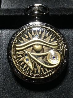 As with every item listed in my shop, the Eye of Horus Pocket Watch is one of a kind. Each Eye of Horus pocket watch design is made to order. This listing price is for one Mechanical Pocket Watch. The pocket watch is purchased new, and used as a functional canvas for the art. Each watch is roughly 47 mm in diameter. Each Mechanical Pocket Watch Eye of Horus is individually made. There are no two alike. When you place your order, a pocket watch with an Eye of Horus of similar design will be crafted just for you. We will work with you to design your individual watch. (creativity is encouraged) The watches pictured are a representation of our design concept in Gear Art. The gears used to create the art are a combination of antique and newer watch and clock gears. Any questions, please ask :) Steampunk Pocket Watch With Compass Design, Steampunk Silver Watch Accessories Gift, Steampunk Style Silver Watch Accessories Gift, Silver Steampunk Watch Accessories Gift, Steampunk Style Silver Watch Accessories For Gift, Metal Round Watch Accessories For Gift, Antique Silver Watch Accessories Gift, Antique Silver Watch Accessories As Gift, Antique Silver Watch Accessories For Gift