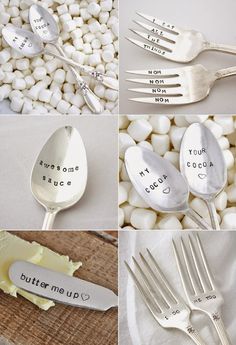 four different spoons with words written on them and some white rocks in the background