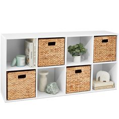 four white shelves with wicker bins and baskets on each shelf, one is filled with books