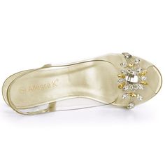 A pair of elegant, clear slingback style sandals with flower rhinestones feature a comfortable cushioned insole that snuggles your feet to provide comfort with every step. These sandals are playful and reflect an extravagant look. Easy to be paired with jeans or dresses for a casual look. It's beautiful and elegant and perfect for office, interview, party, casual, Christmas Day, dating, and evening. Elegant Open Toe Jelly Sandals For Parties, Elegant Open Toe Jelly Sandals With Clear Strap, Elegant Round Toe Jelly Sandals For Party, Clear Sandals For Spring Wedding, Elegant Jelly Sandals For Evening In Spring, Spring Wedding Clear Sandals, Elegant Open Toe Synthetic Jelly Sandals, Elegant Jelly Sandals For Spring, Elegant Sandals With Clear Strap And Synthetic Material