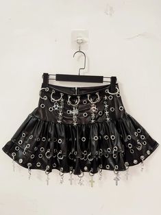 🌟 Embrace Gothic Elegance: Gothic Skull Short Skirt 👗 Unleash Your Dark Side: Step into the realm of gothic fashion with the Gothic Skull Short Skirt, meticulously crafted for those who seek to embrace their inner darkness with sophistication. This skirt is a must-have for anyone looking to add a touch of dark allure to their wardrobe. ✨ Superior Comfort and Striking Design: Crafted from high-quality fabric, this short skirt offers exceptional comfort and style. The striking skull motifs add a Punk Mini Skirt For Halloween, Edgy Tiered Mini Skirt For Party, Punk Mini Skirt For Halloween Cosplay, Alternative Mini Skirt For Halloween, Black Punk Mini Skirt For Festival, Punk Style Black Mini Skirt For Festival, Alternative Fashion Halloween Skirt, Edgy Skirt For Halloween Costume Party, Alternative Halloween Skirt