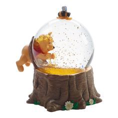 winnie the pooh figurine in a snow globe