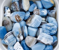 "This is a listing for one(1) piece of Blue Opal Tumbled Stone. These blue tumbled stones are small to medium size as tumbled stones and they have color combinations of maya blue, soft blue, white, grey, and black with natural lines, patterns, scratches, and chips. They are very unique and some of them have patterns and some don't. I will carefully pick one piece for you. **I anoint each stone with a sacred rose or lavender oil blend before packing so there may be a trace amount still on your cr Maya Blue, Rock And Minerals, Cool Rocks, Natural Line, Blue Soft, Minerals And Gemstones, Cute Stationery, Flower Oil, Amethyst Quartz