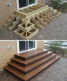 some steps made out of wood sitting on the ground