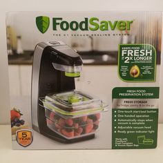 the box is full of fresh fruit and has an automatic food processor on it's side