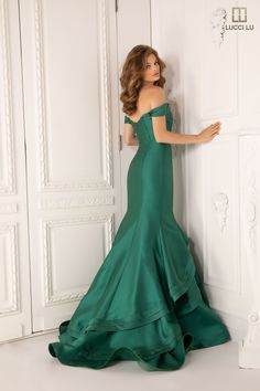 Color: Emerald Green Neckline: Off the Shoulder Sweetheart Silhouette: Mermaid Fabric: Mikado Brand: Lucci Lu Style #: 8113 Mermaid Emerald Green Dress, Emerald Mermaid Dress, Pageant Dress With Fitted Bodice And Mermaid Hem, Mermaid Gown With Fitted Bodice For Prom Season, Fitted Mermaid Dress With Mermaid Hem For Pageant, Evening Dress With Corset Back And Mermaid Hem, Fitted Mermaid Dress For Pageant, Fitted Mermaid Dress For Pageants, Sweetheart Neckline Evening Dress With Fitted Bodice For Pageant