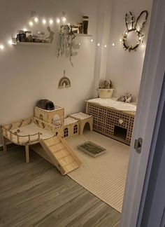 a child's room with toys and lights on the wall