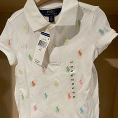 New With Ticket Polos For A 4 Year Girl Ralph Lauren Graphic Print Tops For Summer, Ralph Lauren White Tops With Graphic Print, Ralph Lauren White Top With Graphic Print, Ralph Lauren Graphic Print Summer Tops, White Ralph Lauren T-shirt With Graphic Print, Fitted Cute Ralph Lauren Tops, Cute Fitted Ralph Lauren Tops, Casual Fitted Tops For Playtime, Cute Ralph Lauren Long Sleeve Top