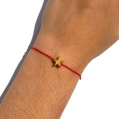 "- Naz Collection Red Parachute String Bracelet Gold Plated Star Charm Gold Plated Stoppers Waterproof Adjustable String 9\" Video Tutorial: https://youtu.be/gKdcQ6e-v2s - High Quality, Unique and Handmade - Made In USA - Minimalist Fashion Style - A Beautiful Gift You Give Yourself and Your Loved Ones - 30 days Products Refund and Exchange Guarantee. We treat our Customers like Family and our Customer Service comes from Heart - Star Bracelet, Friendship Bracelet, Red String Bracelet, Wish Brace Ribbon Friendship Bracelet, Promise Bracelet, Red String Bracelet, Beach Anklets, Bracelet Friendship, Red String, Celestial Jewelry, Protection Bracelet, Wish Bracelets