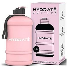 a pink water bottle next to a cardboard box with the words hydrate on it