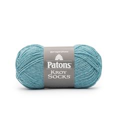 patons kroy socks yarn in blue, on a white background with the words