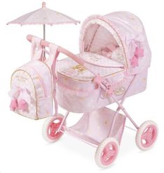 a pink stroller with a baby carriage and umbrella