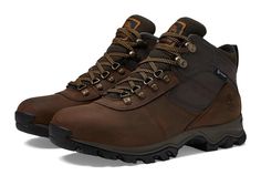 Timberland Earthkeepers(r) Mt. Maddsen Mid Waterproof - Men's Lace-up Boots : Dark Brown : The next time you hit the trails, make sure you're fully comforted by the Timberland Earthkeepers&amp,#174, Mt. Maddsen Mid Waterproof lace-up boot. Timber-Dry eco-conscious waterproof membrane keeps feet dry in any weather. Hiking boot features a full grain waterproof leather upper with a fully gusseted tongue provides comfort and keeps debris out. Exclusive anti-fatigue comfort technology provides all-day comfort and support. Internal TPU shank for torsional rigidity. Compression-molded EVA midsole provides lightweight cushioning and shock absorption for all-day comfort. Durable 15% recycled rubber lug outsole is designed for traction. B.S.F.P.&amp,#8482, motion efficiency system active rubber lug Brown Timberland Gore-tex Hiking Boots, Brown Timberland Waterproof Boots, Brown Timberland Waterproof Functional Boots, Timberland Brown Gore-tex Work Boots, Sturdy Waterproof Boots For Outdoor Activities With Round Toe, Waterproof Sturdy Boots For Outdoor Activities, Sturdy Waterproof Boots For Outdoor Activities, Rugged Sturdy Waterproof Hiking Boots, Rugged Sturdy Hiking Boots For Outdoor Activities