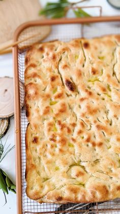 a close up of a bread on a cooling rack