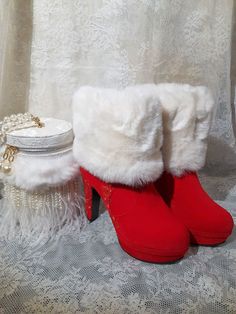 These stunning boots are made from flock and decorated with faux fur and lace. It will be a great accessory for Christmas parties or Christmas weddings. It will make an awesome gift for your bride,bridesmaid or for any person that wants to have a special Christmas outfit. Specifications: Heel Height: 12cm Closure Type: zipper Colour: red If your feet are wide,please choose 1 size up. Any questions,please don't hesitate to contact me. -------------------- International Shoppers: Please send me a message with your location for details about shipping costs as there are faster deliveries available. Add our shop to your Favorites to get the unique coupon codes and discounts! Party Boots With Faux Fur Lining, Party Boots With Faux Fur Trim And Round Toe, High Heel Winter Wedding Boots, Winter Wedding Boots With Round Toe, Lace Wedding Boots, Wedding High Heels, Bridal Boots, Christmas Boots, Wedding Boots