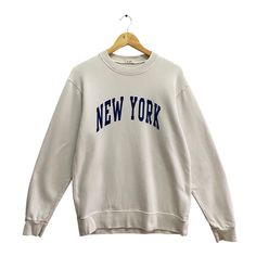 Code : p/335 Vintage New York White Sweatshirt Size Large New York Crewneck New York City  Sweater Pullover New York Spell Out Print Logo Jumper Size on Tag :  L Details Measurement  Arm Pit to Arm Pit : 22"inches Back Collar to Hem : 27"inches Condition :  Great Vintage Condition(Used Clothing).No Holes And No Stain.Please refer pictures detail.‼️ New York Crewneck, New York Shirt, New York Sweatshirt, Fashion Sweatshirts, New York Vintage, Vintage New York, Nova York, Hoodie Outfit, Sweater Pullover