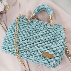 👜GENERAL FEATURES👜  FeyZolfey crochet bag is produced from 100% polypropylene yarn. The overall dimensions of this women's shoulder bag are 26x23x7cm. This knitted purse also offers sophisticated styling. This luxury bag has one (110cm) chain shoulder strap and two crocheted top handle that allows you to wear it as a classic handbag. These handmade summer bags do not contain chemicals that may affect human health. ⭐A UNIQUE PIECE⭐  FeyZolfey zipper bag for girls has a magnificent look thanks to its unique design. Woven bags for women, which have multiple uses, can be used daily, on the beach, at an invitation, or in areas such as school. Due to the perfect size of this small handbag, necessary items such as a phone, wallet, small makeup pouch, and notepad can be carried. It is the ideal Luxury Woven Crochet Summer Bag, Luxury Designer Crochet Bag, Popular Handbags Crochet, Cheap Women's Handheld Crochet Bag, Luxury Handmade Top Handle Shoulder Bag, Luxury Crochet Pouch Bag For Women, Luxury Casual Crochet Bag, Luxury Summer Style Woven Crochet Bag, Luxury Crochet Satchel Bag With Braided Handles