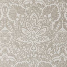 an old wallpaper pattern in grey and white