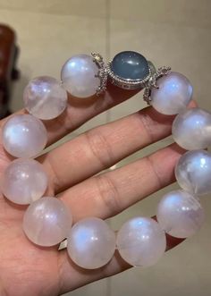 Material:moonstone beads size :Approx 16mm   quantity: one strand  6mm approx 29 pcs one strands 7mm approx25 pcs one strands 8mm approx 22 pcs one strands 9mm approx 21pcs one strands 10mm approx 19 pcs one strands 11mm approx 18pcs one strands 12mm approx 16 pcs one strands 13mm approx 16 pcs one strands 14mm approx 15 pcs one strands 15mm approx 14pcs one strands 16mm approx 14 pcs one strands 17mm approx 13pcs one strands 18mm approx 13pcs one strands 19mm approx 12pcs one strands 20mm appro Moonstone Round Beads Jewelry, Moonstone Beaded Bracelets For Healing, Silver Moonstone Round Bead Bracelets, Moonstone Crystal Bracelet With 8mm Beads As Gift, Elegant Crystal Bracelet With Gemstone Beads And Moonstone, Moonstone Bracelets As A Gift, Silver Moonstone Bracelets With Round Beads, Round Moonstone Bracelets For Gift, Moonstone Crystal Bracelet Gift