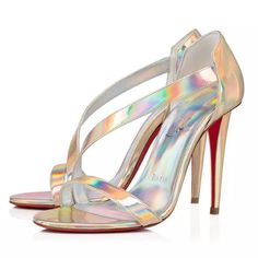 Christian Louboutin Astridal 100 Iridescent Patent Heels Sandals Shoes Size 37 Box Is Marked 39. Shoes Are A 37. Christian Louboutin "Astridal" Sandals In Shiny Iridescent Leather. 4" Stiletto Heel. Crossover Band At Vamp. Slip-On Style. Signature Louboutin Red Bottom These Are Authentic Christian Louboutin Patent Psychic Astridal 100 Pumps Size 37. These Pumps Are Crafted Of Patent Leather In Metallic Silver. They Have A 4 Inch Wrapped Stiletto And Red Soles. Note: Shoe Has A Damage On One Heel Silver Patent Leather High Heel Sandals, Silver Patent Leather Heels With Wrapped Heel, Silver High Heel Patent Leather Sandals, Metallic Pointed Toe Evening Sandals, Metallic Pointed Toe Sandals For Evening, Iridescent Open Toe Sandals For Party, Luxury Metallic Pointed Toe Sandals, Iridescent Pointed Toe Evening Heels, Iridescent Heels With Pointed Toe For Evening